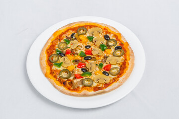 Hot fresh Chicken mushroom jalapeno pizza on white plate isolated white background. Homemade Pizza. Top views.