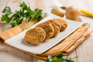 fish croquettes with garlic and potatoes