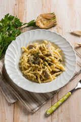 trofie pasta with artichoke and garlic