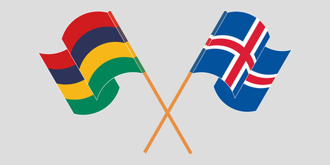 Crossed and waving flags of Mauritius and Iceland