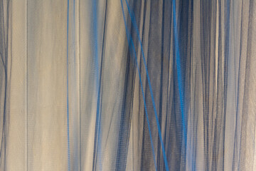 Backdrop of multicolored veils with light effects
