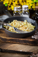 Fried onion in a cast iron skillet.