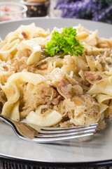 Pasta with sauerkraut and bacon.