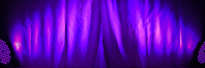 Background with curtain illuminated by strobe light