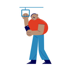 Man standing in subway coach and looking on smartphone screen