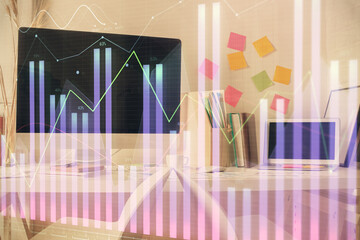 Double exposure of financial graph drawing and office interior background. Concept of stock market.