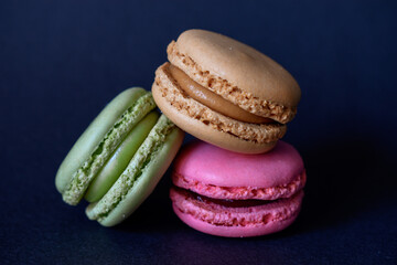 macaroons on a black background 