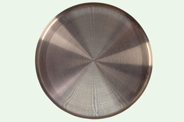 Stainless steel disc isolated on colored background