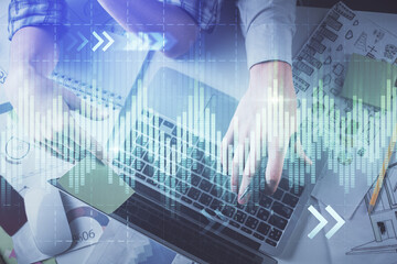 Double exposure of man and woman working together and forex graph hologram drawing. Financial analysis concept. Computer background. Top View.