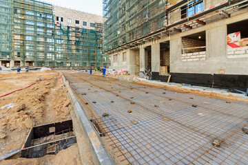 Construction of road. Sandy platform under roadway road roller (compactor, just roller). Flattened...