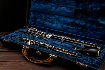 English horn or oboe in a case on a wooden surface