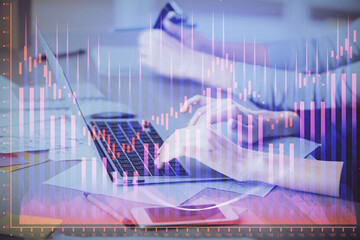 Multi exposure of woman hands typing on computer and financial chart hologram drawing. Stock market analysis concept.