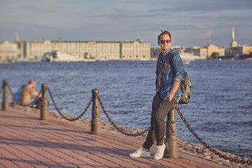 Man near waterfront of Neva river.