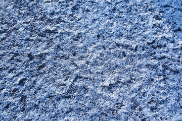 a Snow ice on a wooden background.