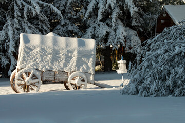 Covered wagon after snowstorm;  Jackson Hole;  Wyoming