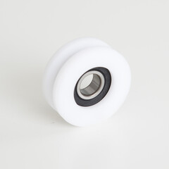 Small plastic pulley with ball bearing