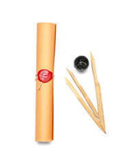 Scroll with dip pens and ink on white background