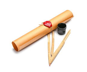 Scroll with dip pens and ink on white background