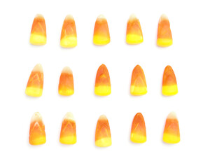 Tasty candies for Halloween on white background