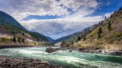 Fototapeta na wymiar Thompson River with its many rapids flowing through the Canyon in the Coastal Mountain Ranges of British Columbia, Canada