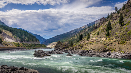 Thompson River with its many rapids flowing through the Canyon in the Coastal Mountain Ranges of British Columbia, Canada