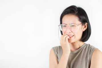 A cute Asian woman with short black hair, white teeth and big eyeglasses is smiling happily.