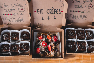 Shot of brownies and crepes with berries