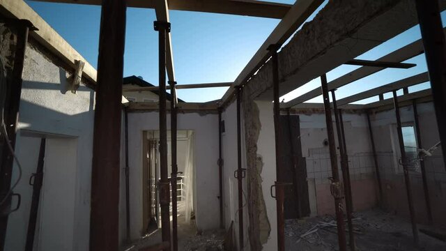 Wooden shuttering with props. Wooden shuttering supported by props set up for casting concrete slab