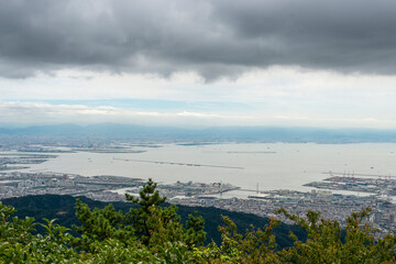 Obraz premium Far view of Osaka bay from mount Rokko in Kobe city, Hyogo, Japan