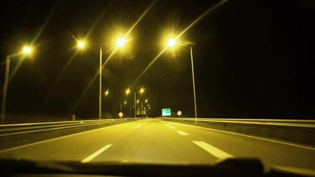 Driving pov ultrawide futuristic highway at night in Macedonia