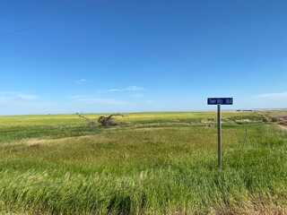 Road sign in a farmer’s field