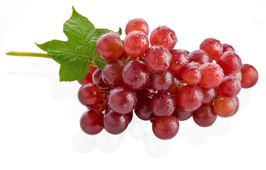 Ripe red grape with leaf isolated on white
