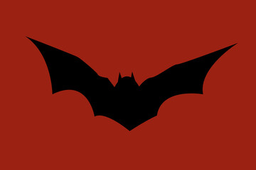 Halloween the bat on red background.