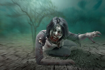 Scary zombie with blood and wound on his body crawling
