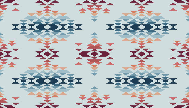 Tribal ethnic multicolored geometric triangle pattern seamless vector abstract background 