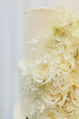 close up of a flower on wedding cake