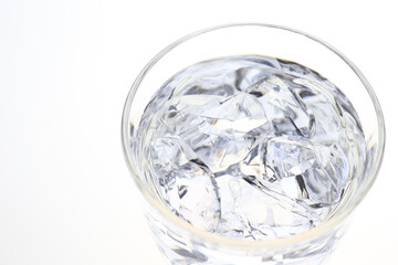 water with ice cubes in glass