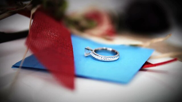 Leaving a Wedding Ring on Message Card. Concept of divorce