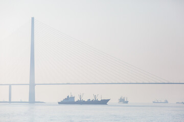 Russian bridge in Vladivostok is shrouded in thick fog