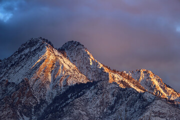 Closeup of Mount Olympus Above Salt Lake City Utah at Sunset in Winter - obrazy, fototapety, plakaty