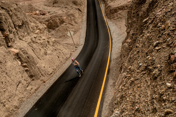 woman with effort running on a road