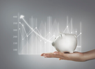The piggy bank is on hand with a graph of savings and investment ideas for future growth.