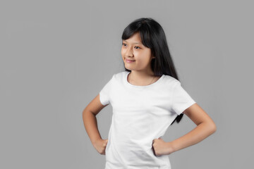 Obraz premium Asian girl studio portrait on gray background