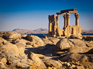 Temple at Kalabsha. Historic ruins of pillars and columns in ancient Egyptian structure.