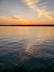 Sunset over calm water on Child's Lake in Duck Mountain Provincial Park, Manitoba, Canada