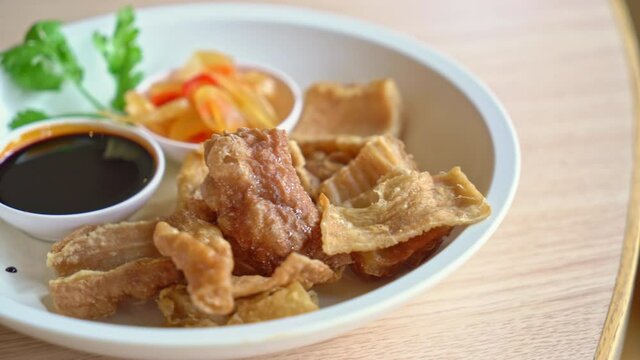 Deep fried pork intestines with sweet black sauce - Asian food style