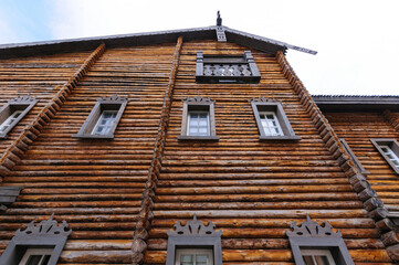 A wooden house made of circular timber