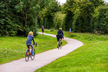 Cyclists Cycling on Bicycles The Greenway Cycle and Walking Track Nr. Stratford upon Avon...