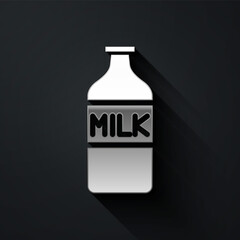 Silver Closed glass bottle with milk icon isolated on black background. Long shadow style. Vector Illustration.