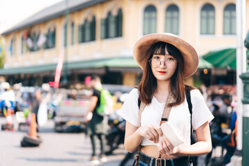 Portrait of traveller adult asian teenager woman in bangkok city